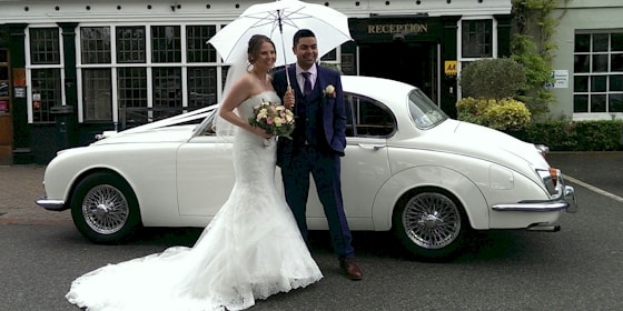 Jaguar Mk2 With Bride And Groom At Reception